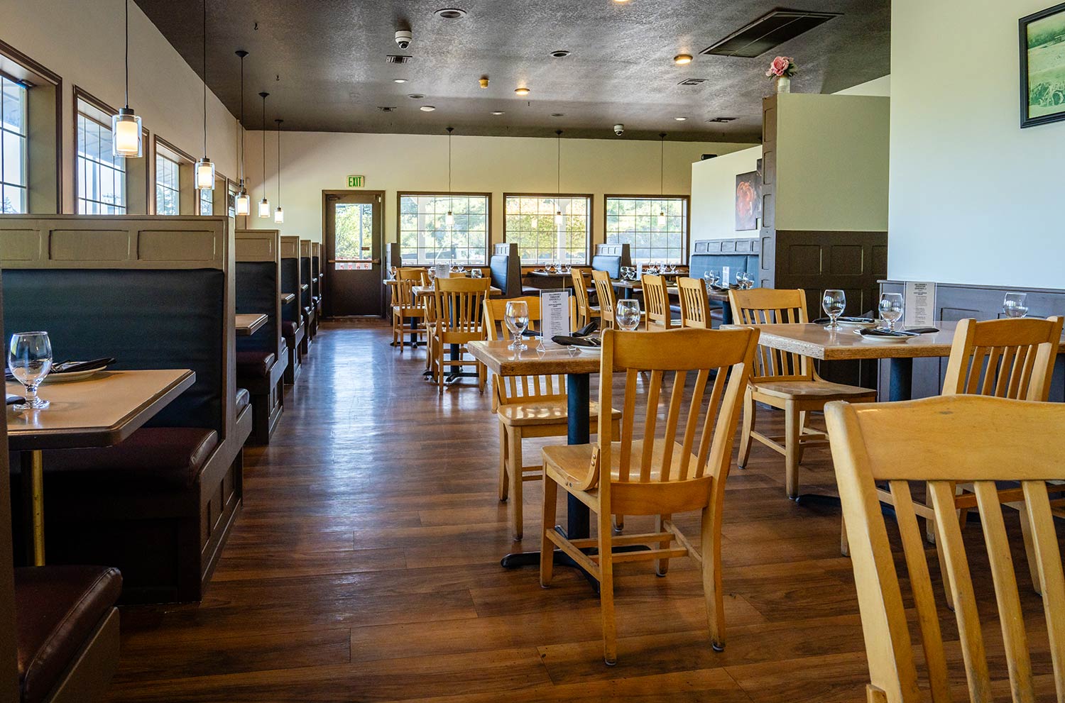 Dining room with booths and tables at The Corner Indian Restaurant in Anacortes WA